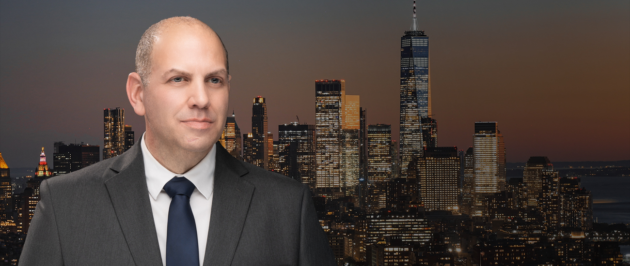 Picture of Steven Ben Gordon with a skyle in the background